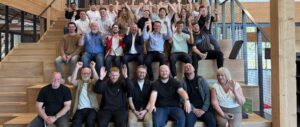 Dundee based employees of Evolt Charging gather for an office meeting.