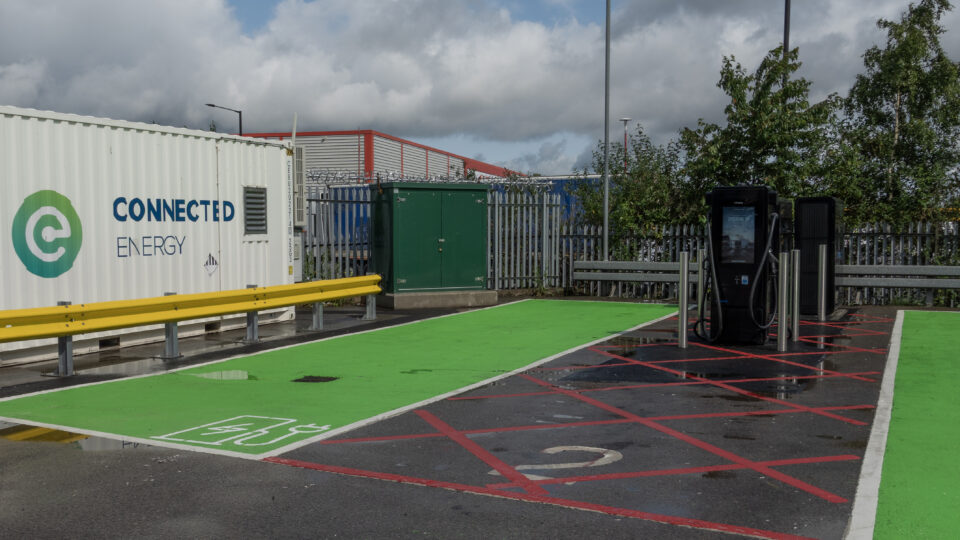An EV Rapid Charger with marked parking bays.